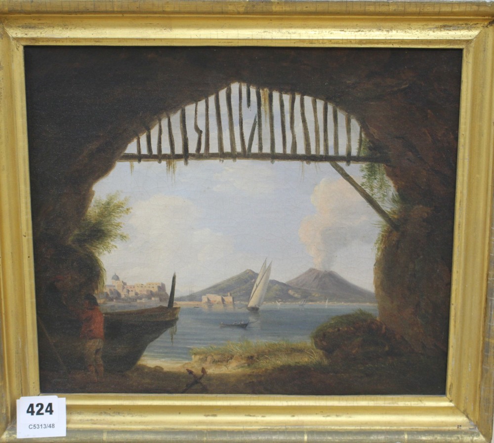 19th century Italian School, oil on canvas, View of Naples and Vesuvius from a fishermans cave, 28 x 33cm